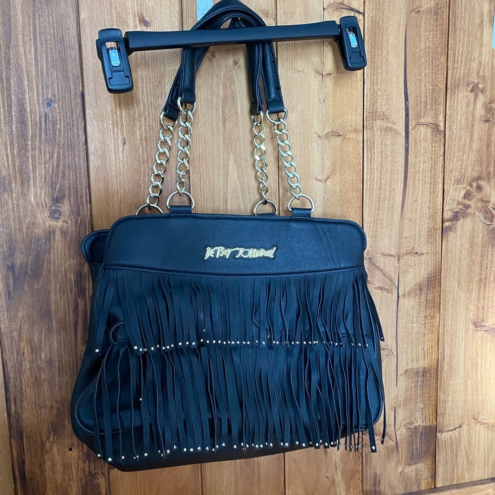 Black women hand bag by Betsey Johnson